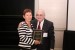 Dr. Nagib Callaos, General Chair, giving Dr. Maria Jakubik a plaque "In Appreciation for Delivering a Great Keynote Address at a Plenary Session."